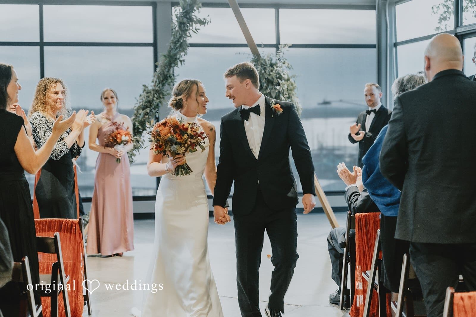 Our Portland wedding photographer at Original Weddings captures a Joyful exit of the couple after The Black Pearl wedding ceremony