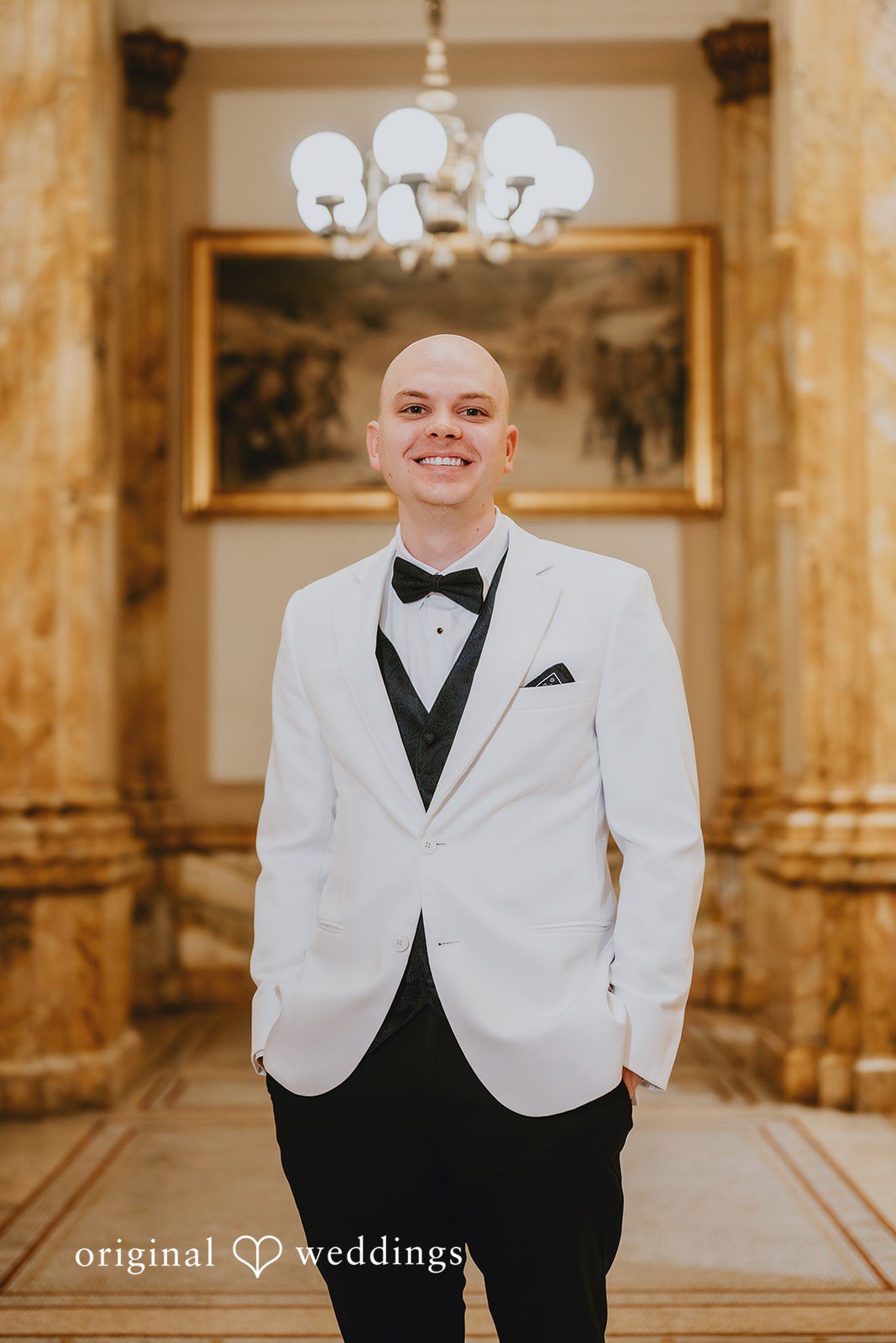 A happy portrait of the groom at The Cooperage