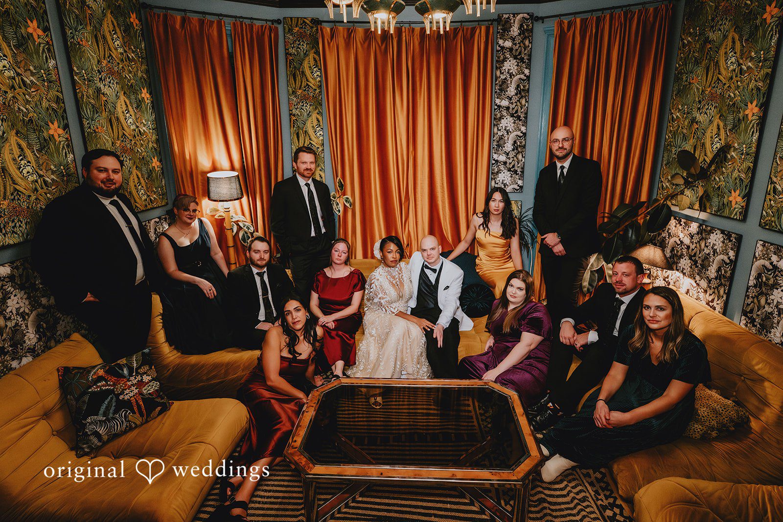 A stunning portrait of the couple and their bridal party at The Cooperage's lodge