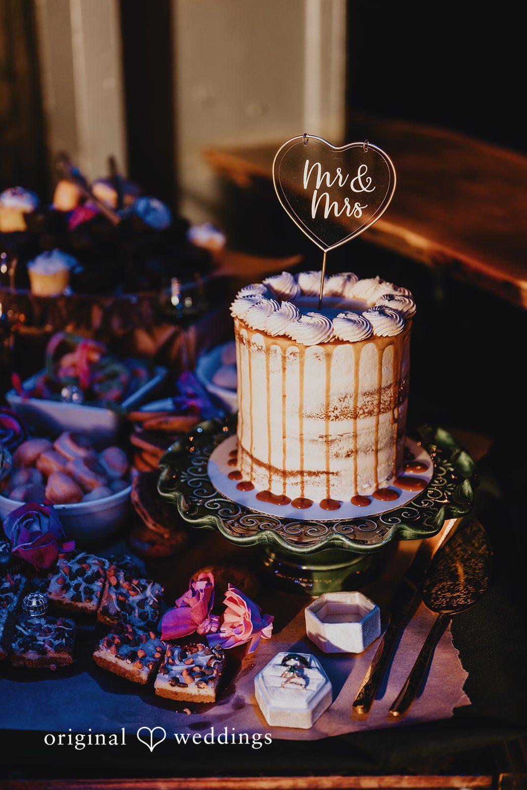 The yummy wedding cake, desserts and wedding rings at The Cooperage wedding reception