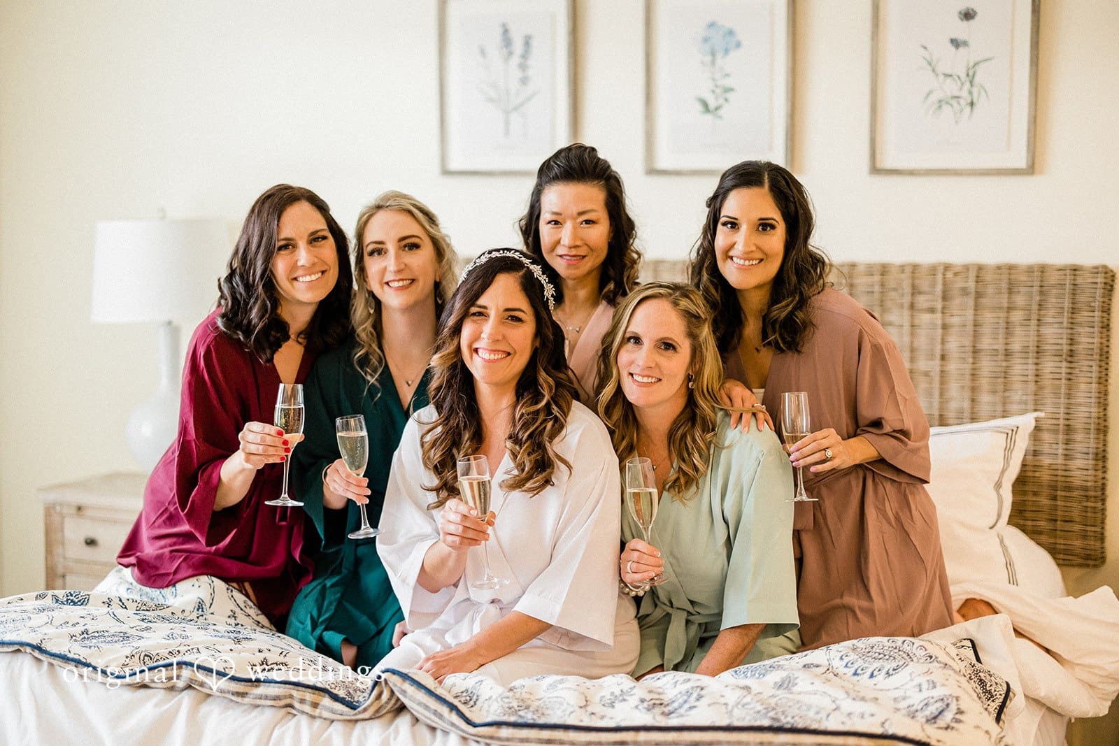 Bride sharing a joyful moment with her bridesmaids