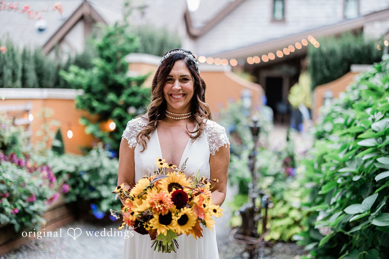 Stunning portrait of bride holding flowers by Seattle wedding photography