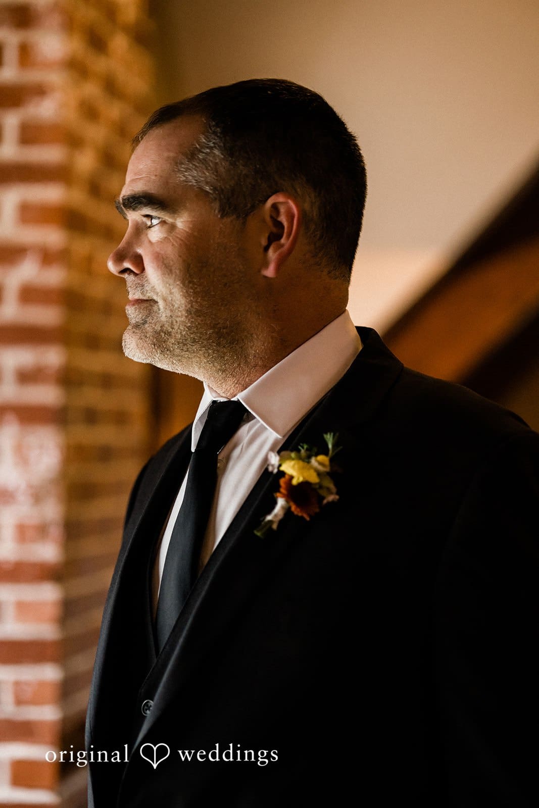 Elegant picture of groom by Seattle wedding photography