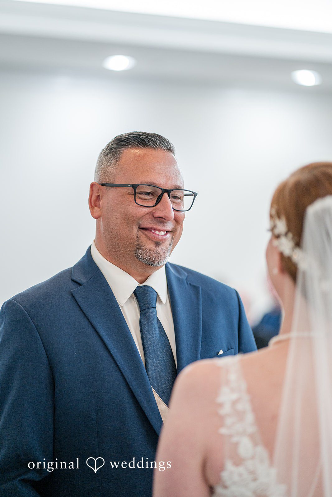 Caitlyn + Greg Couple standing close together.