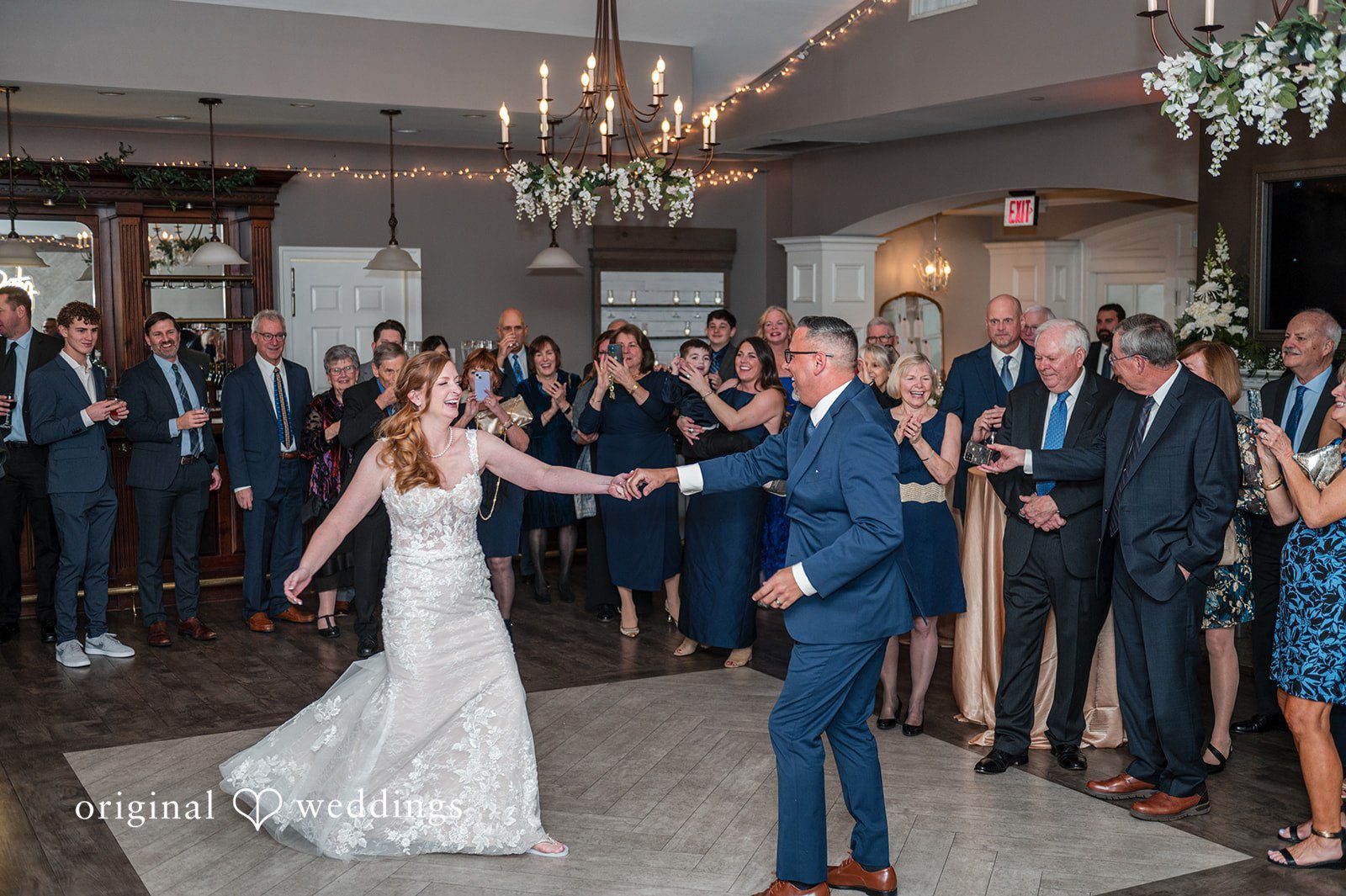 Caitlyn + Greg Couple beginning their first dance at the wedding.