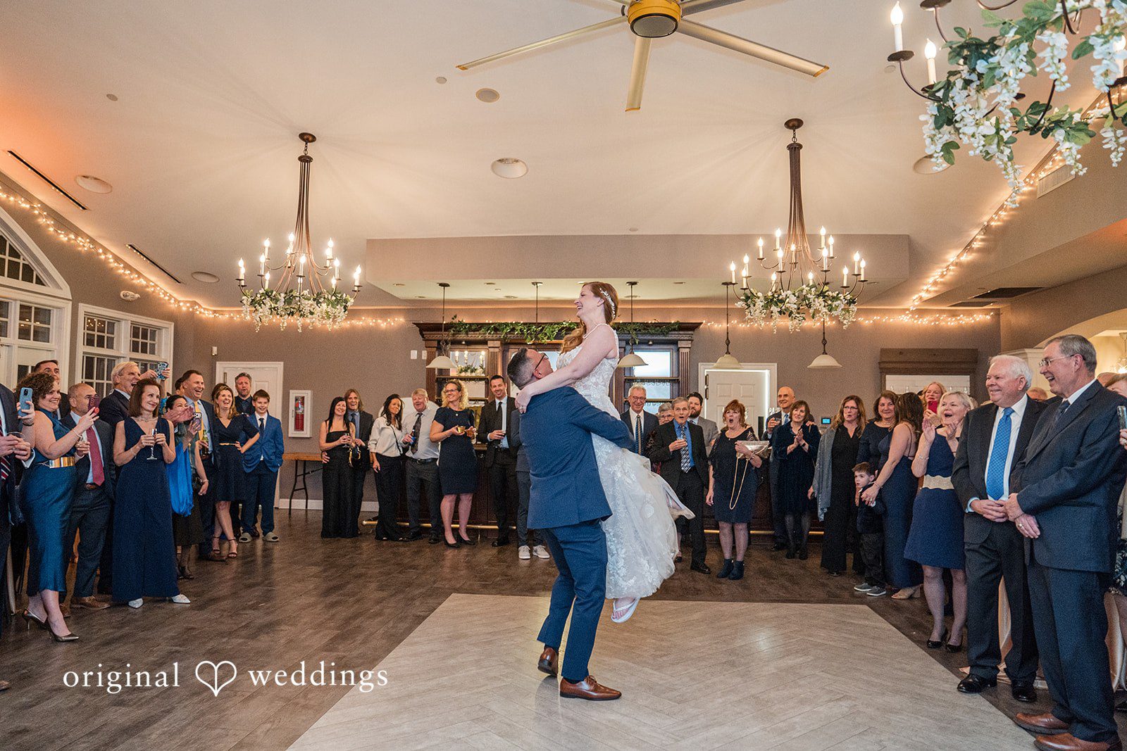 Caitlyn + Greg Newlyweds dancing together at The Osprey’s at Belmont Bay