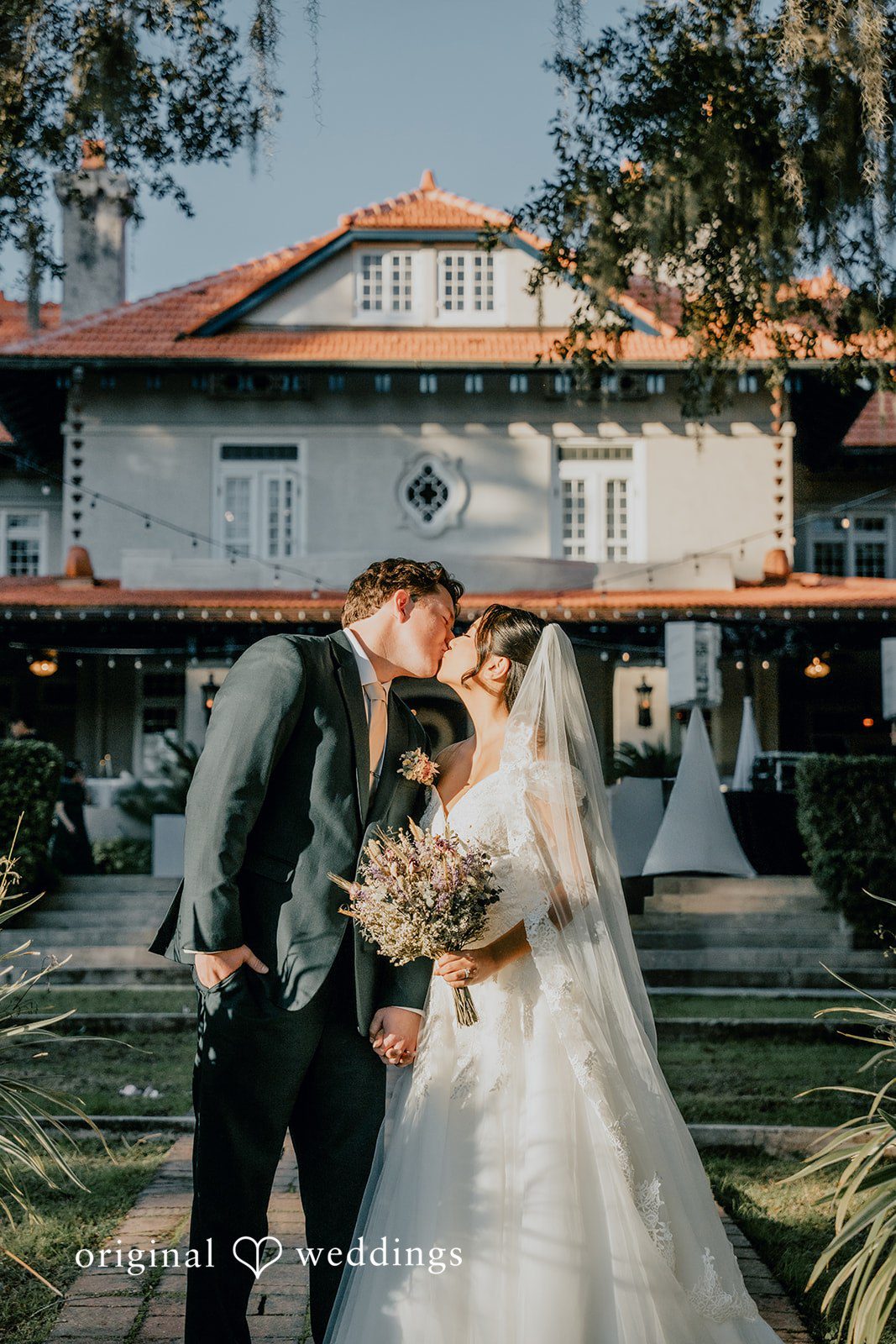 Trisha + Jacob The groom leads the bride in a romantic walk together.