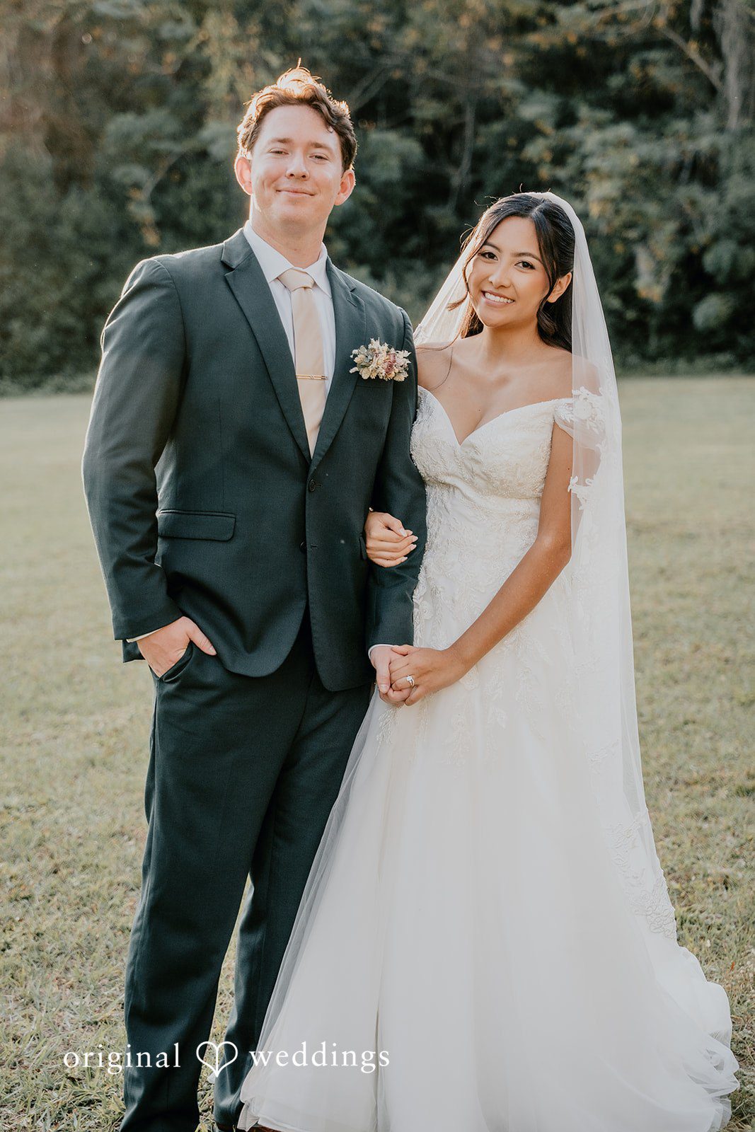 The bride and groom walk side by side in elegance.