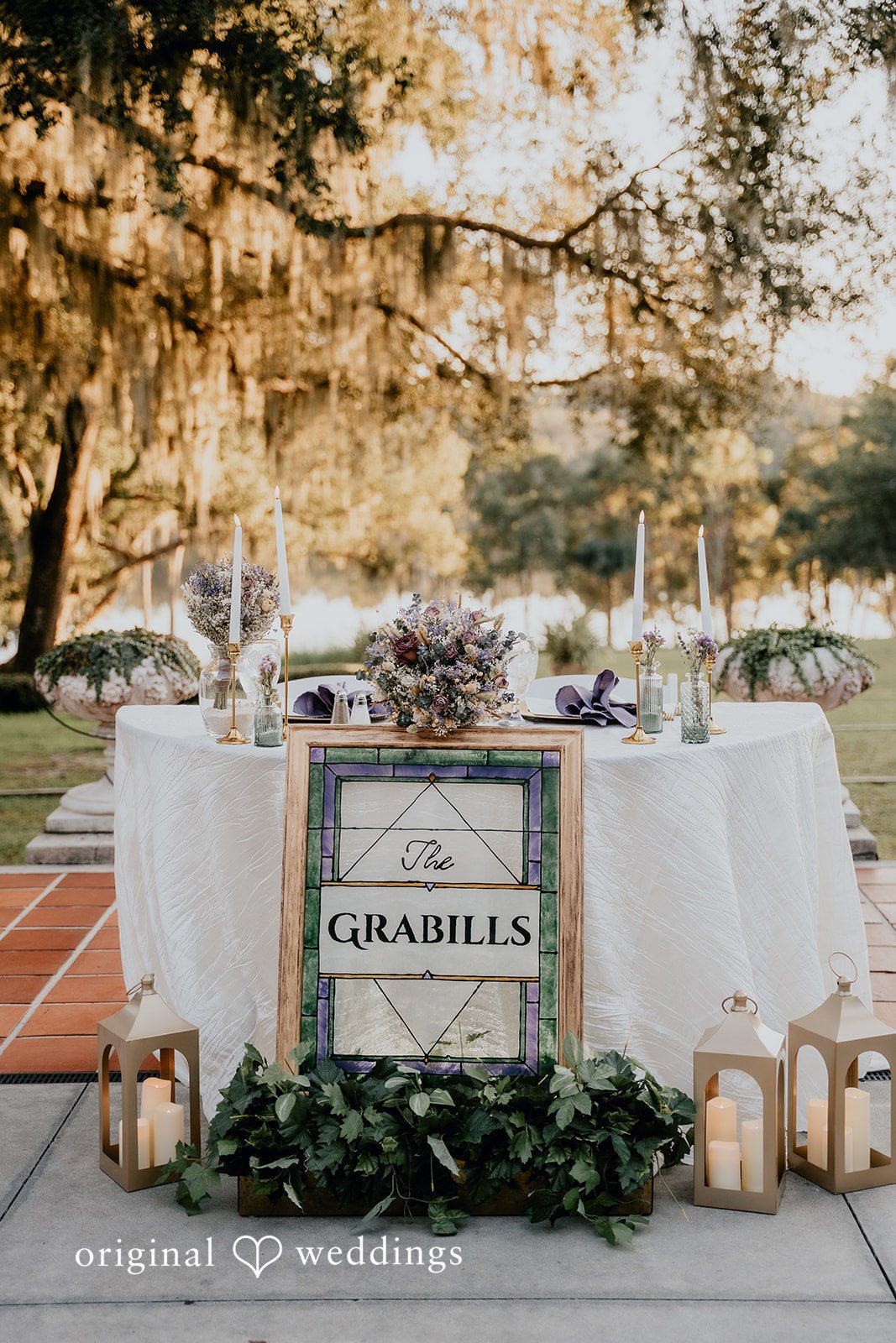 A romantic outdoor table setup creates an intimate atmosphere.