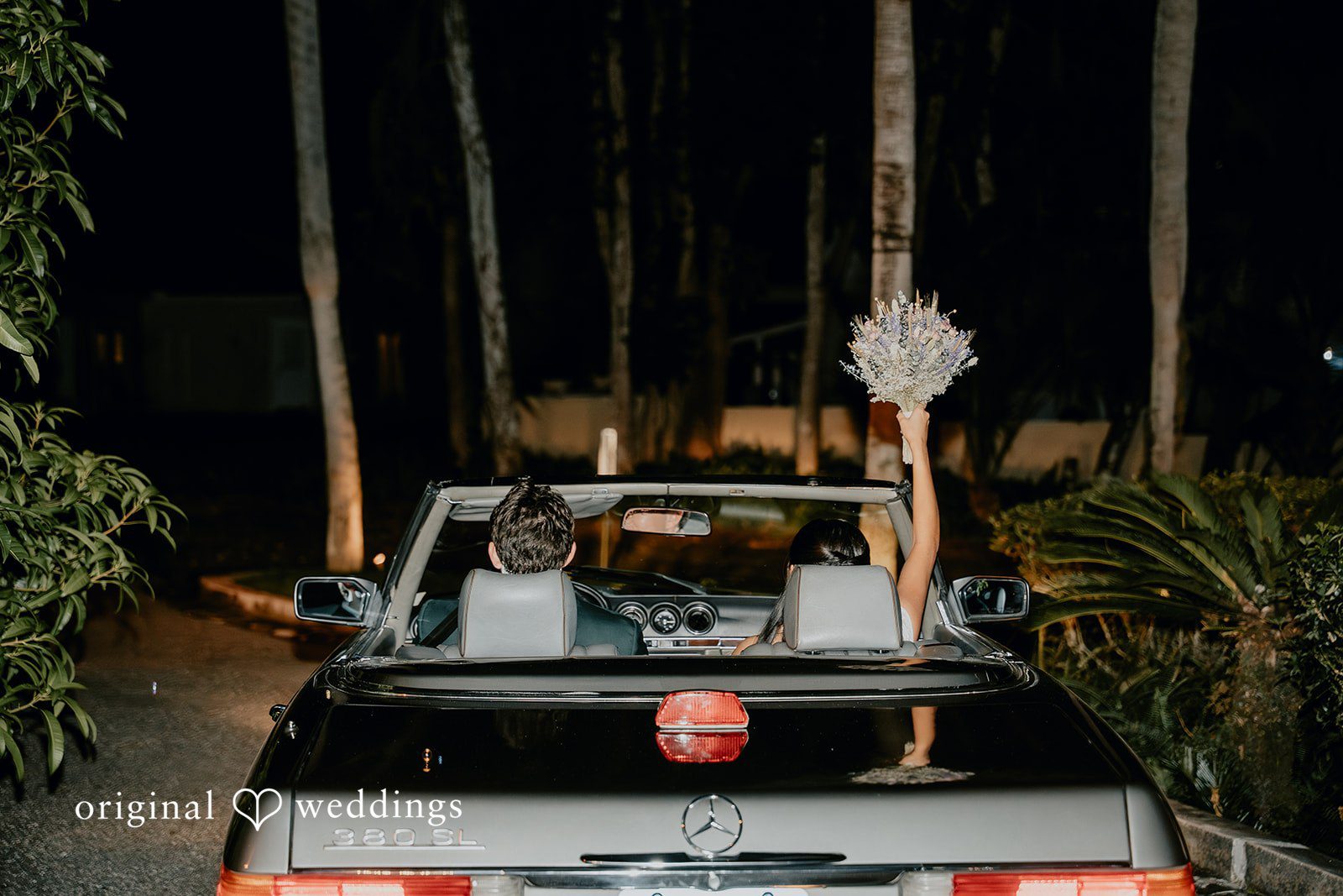 Trisha + Jacob The couple makes a grand exit surrounded by celebration at Orlando wedding photography.