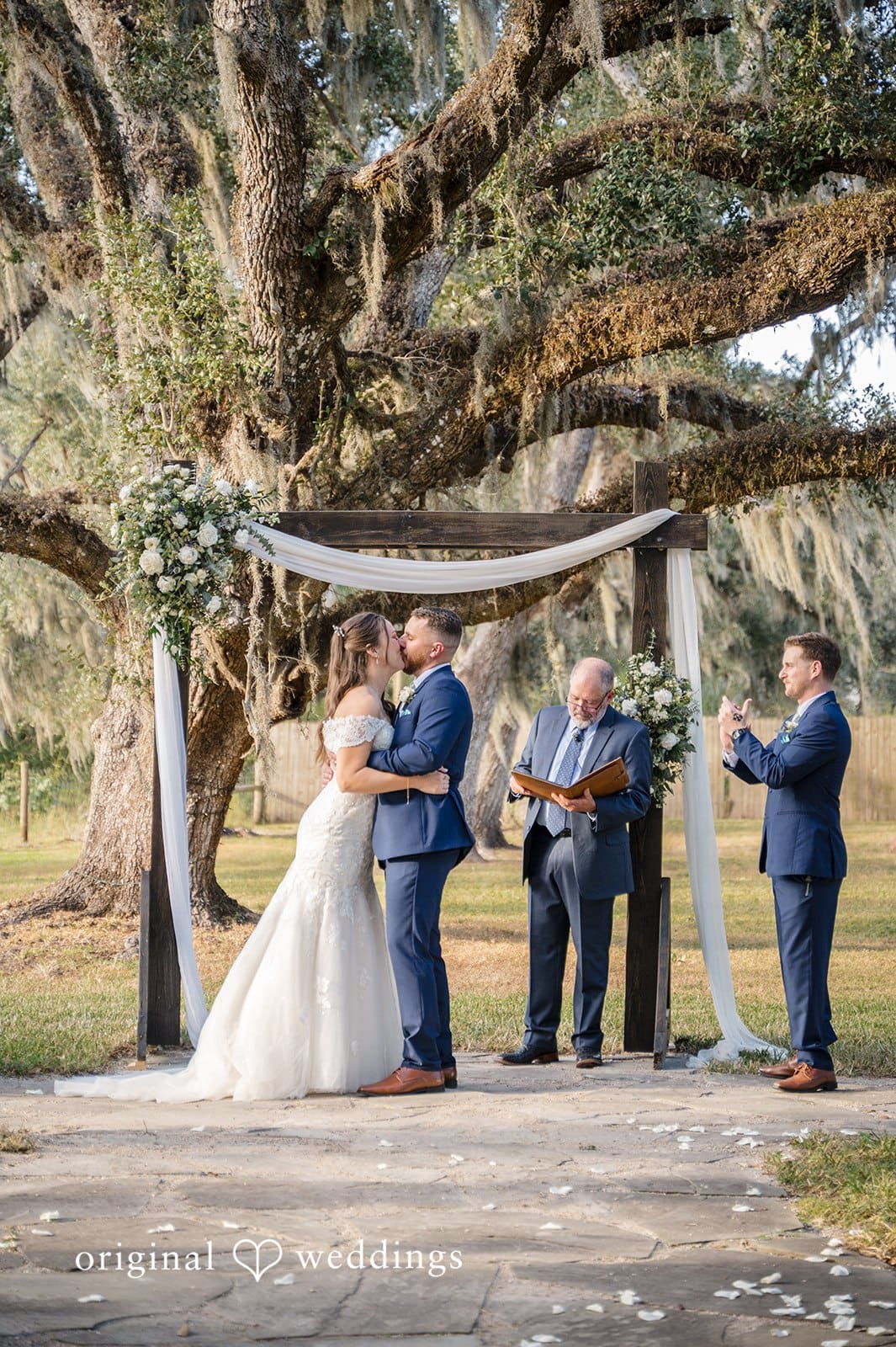 Emotional moments unfold as the couple walks down the aisle.