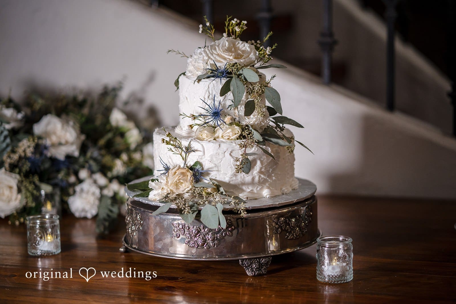 The elegant wedding cake and decor create a stunning display.