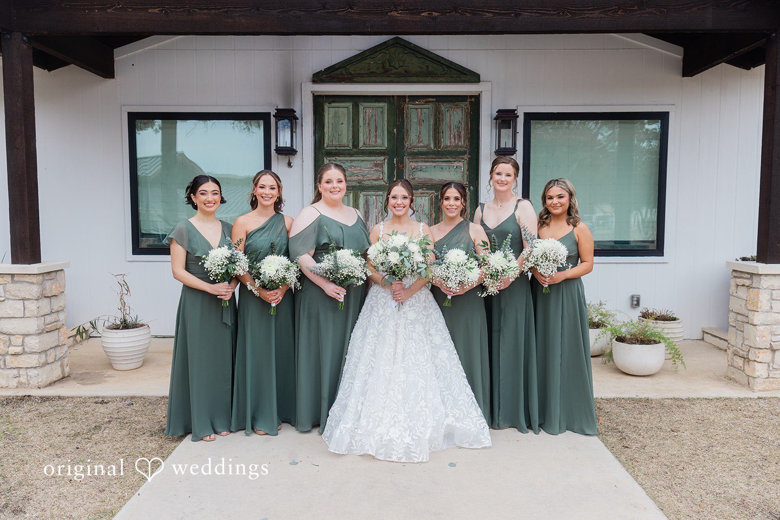 A stunning portrait of the bride and her bridesmaids