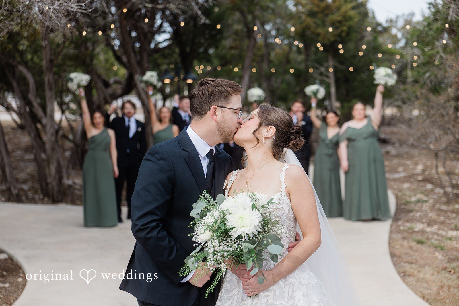 The bride and groom share a kiss at The Videre Estate