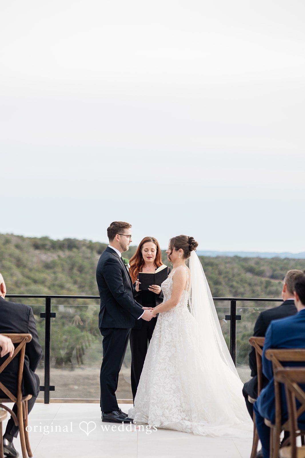 The bride and groom exchange marital vows at The Videre Estate