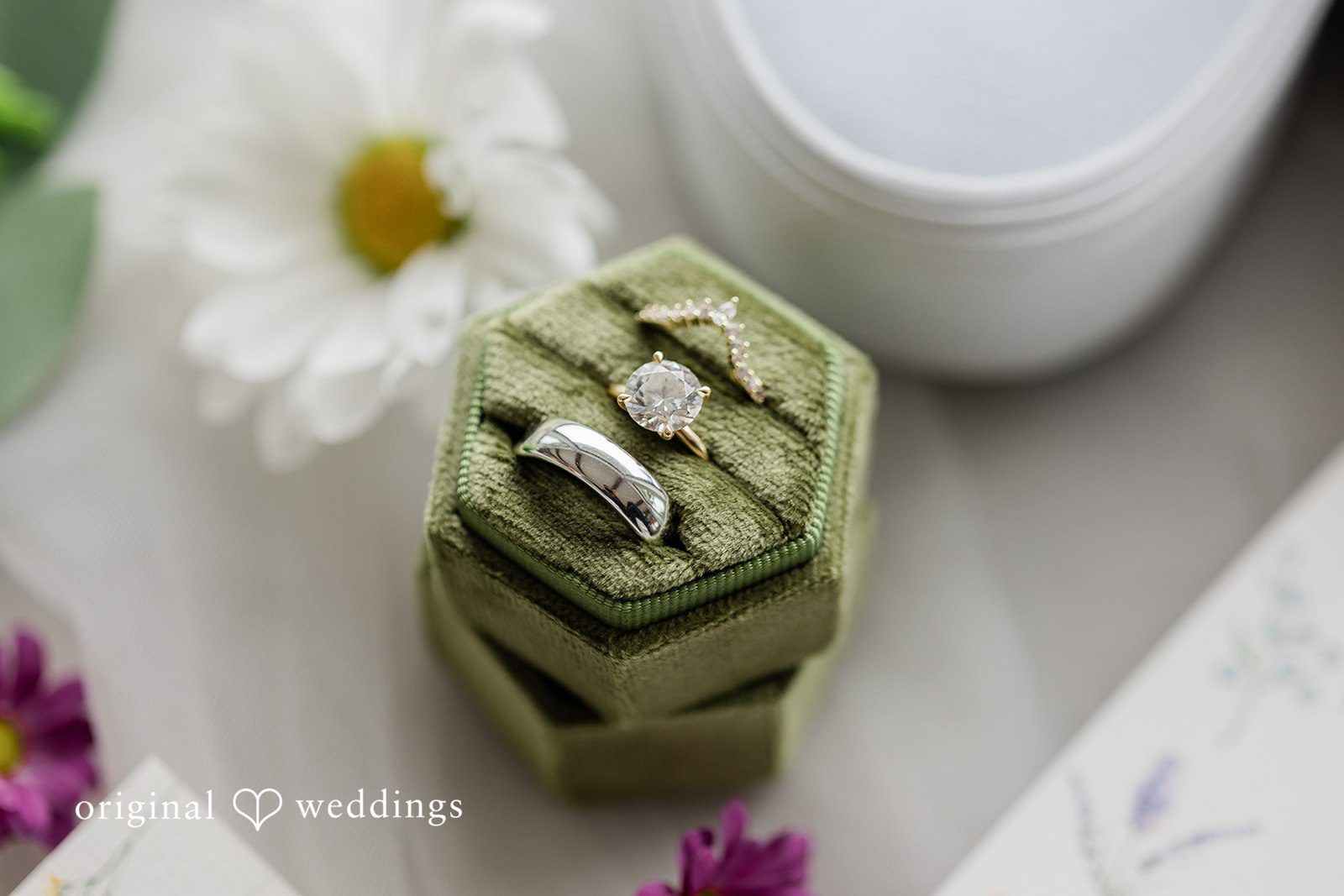 Our Austin wedding photographers captured a detail shot of the wedding rings at The Videre Estate