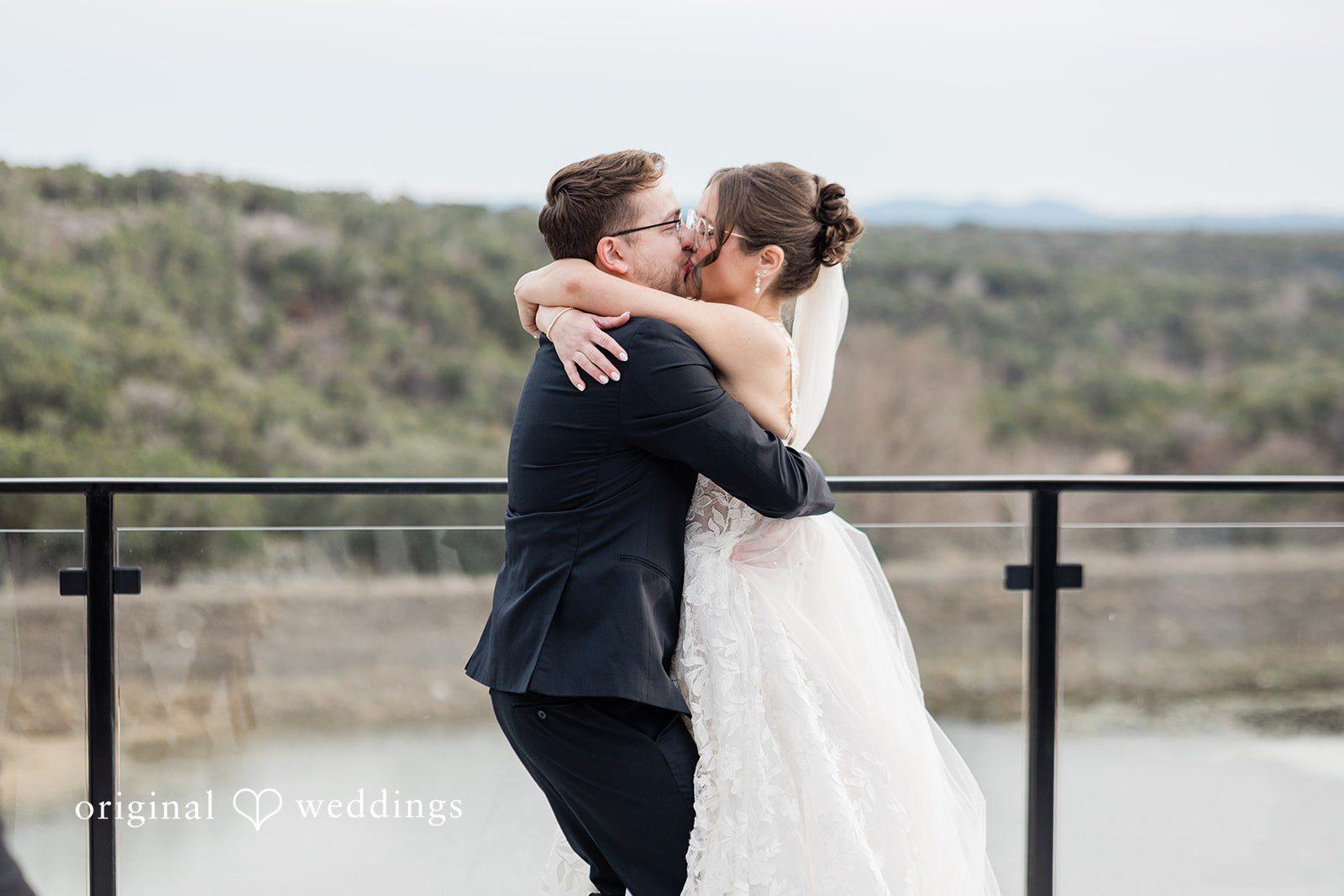 The bride and groom share a kiss
