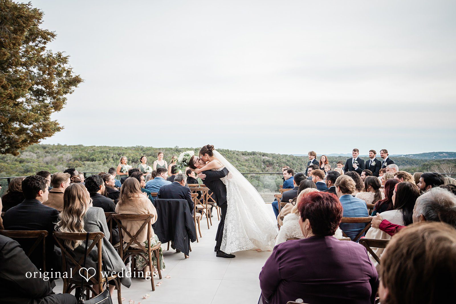 The couple shares a romantic kiss