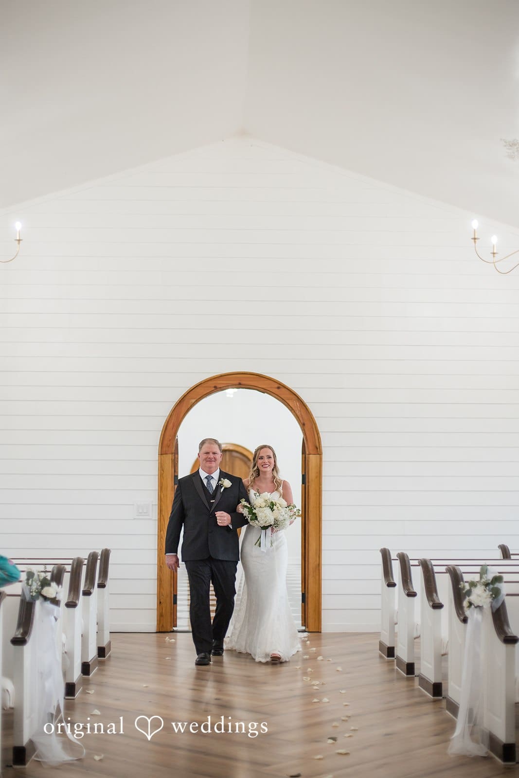 Brianne + Luke Bride walking to the altar