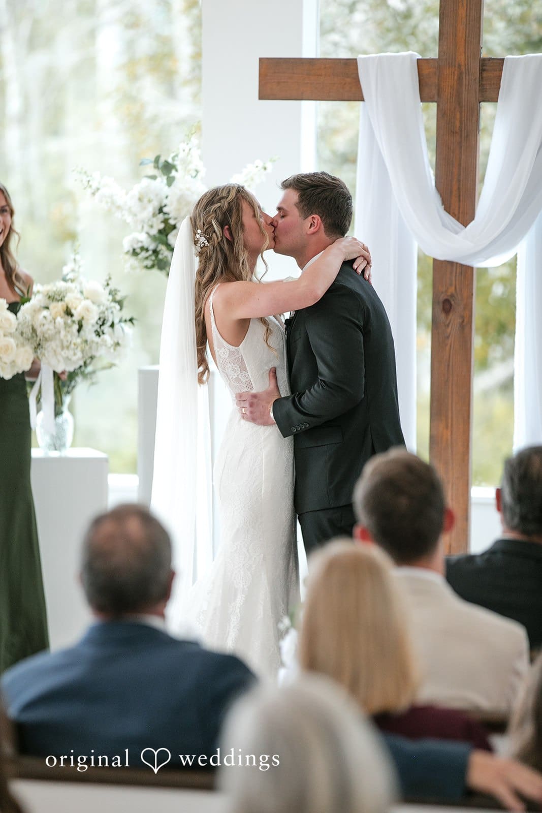 Brianne + Luke Romantic kiss between bride and groom at The Whitewood Ranch, captured by Orlando Wedding Photographers at The Whitewood Ranch