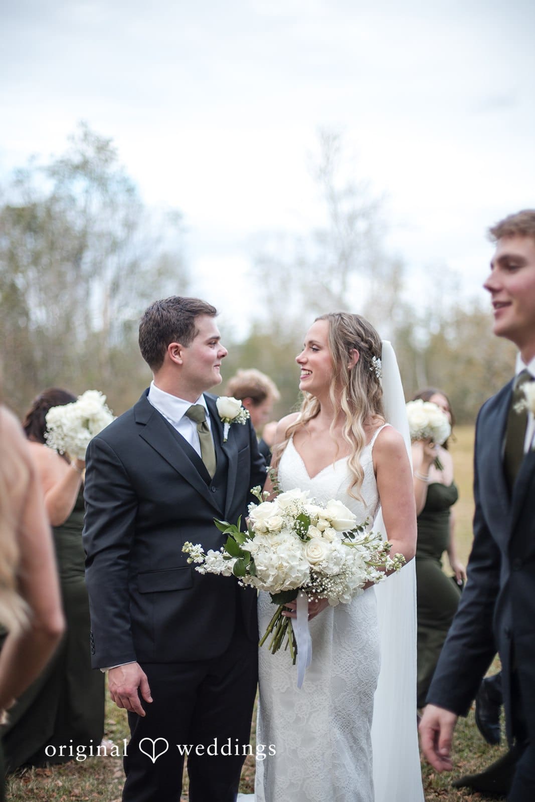 Brianne + Luke Bride and groom posing joyfully