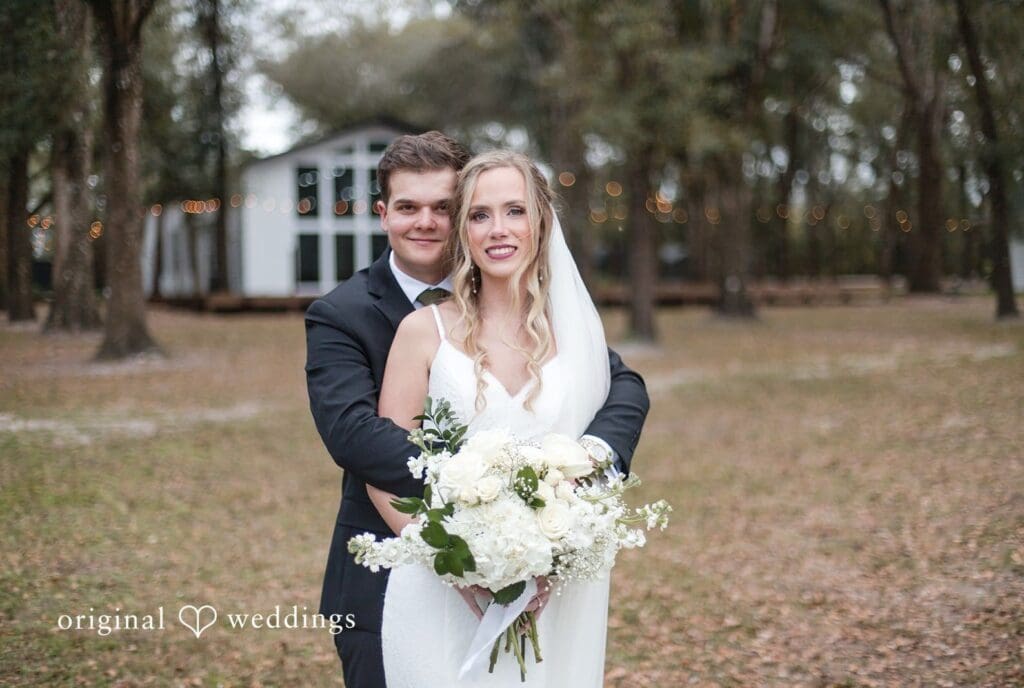 Brianne + Luke Newlyweds sharing a loving gaze at The Whitewood Ranch photographed by Orlando Wedding Photographers from Original Weddings