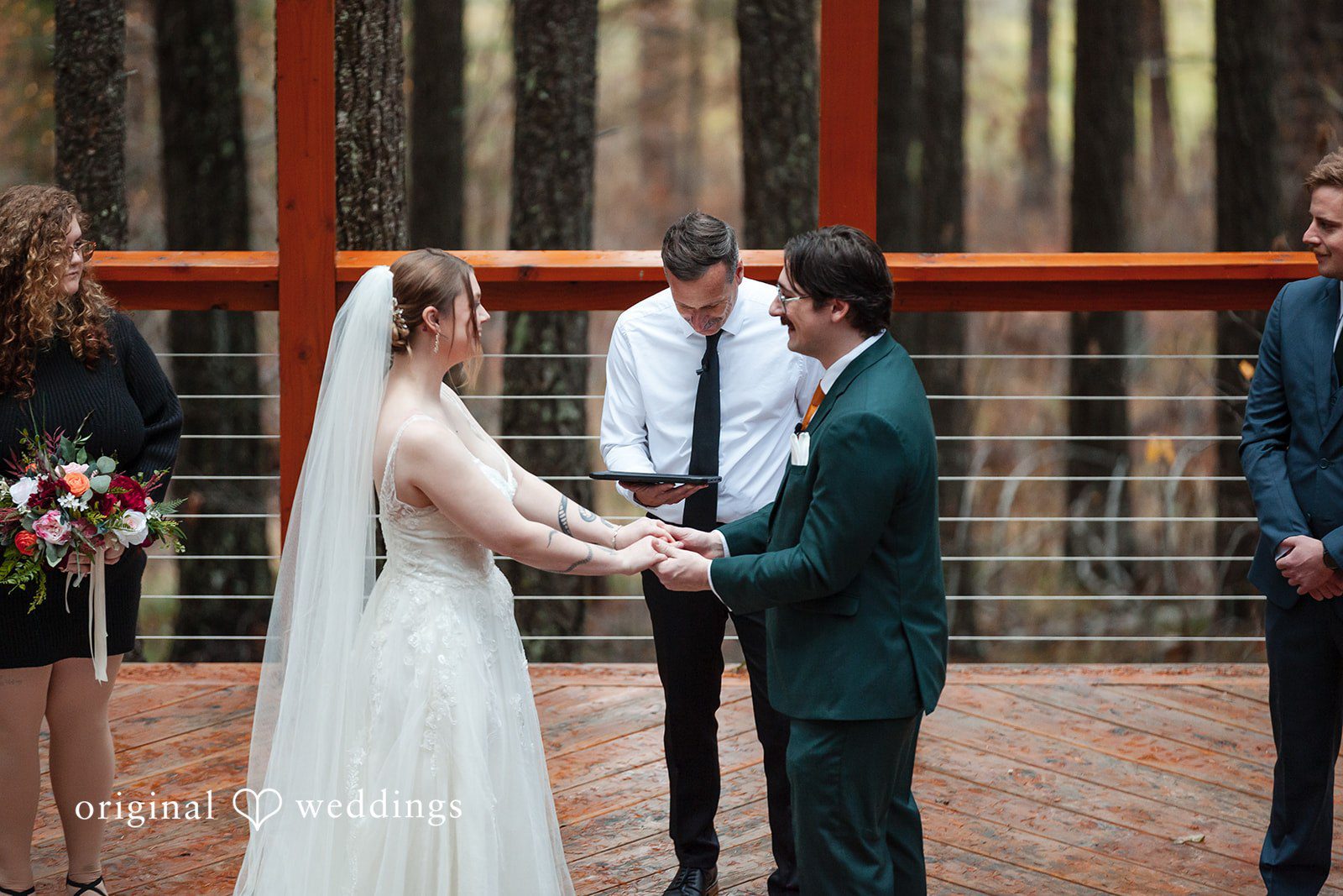 A portrait of the bride and groom about to exchange marital vows