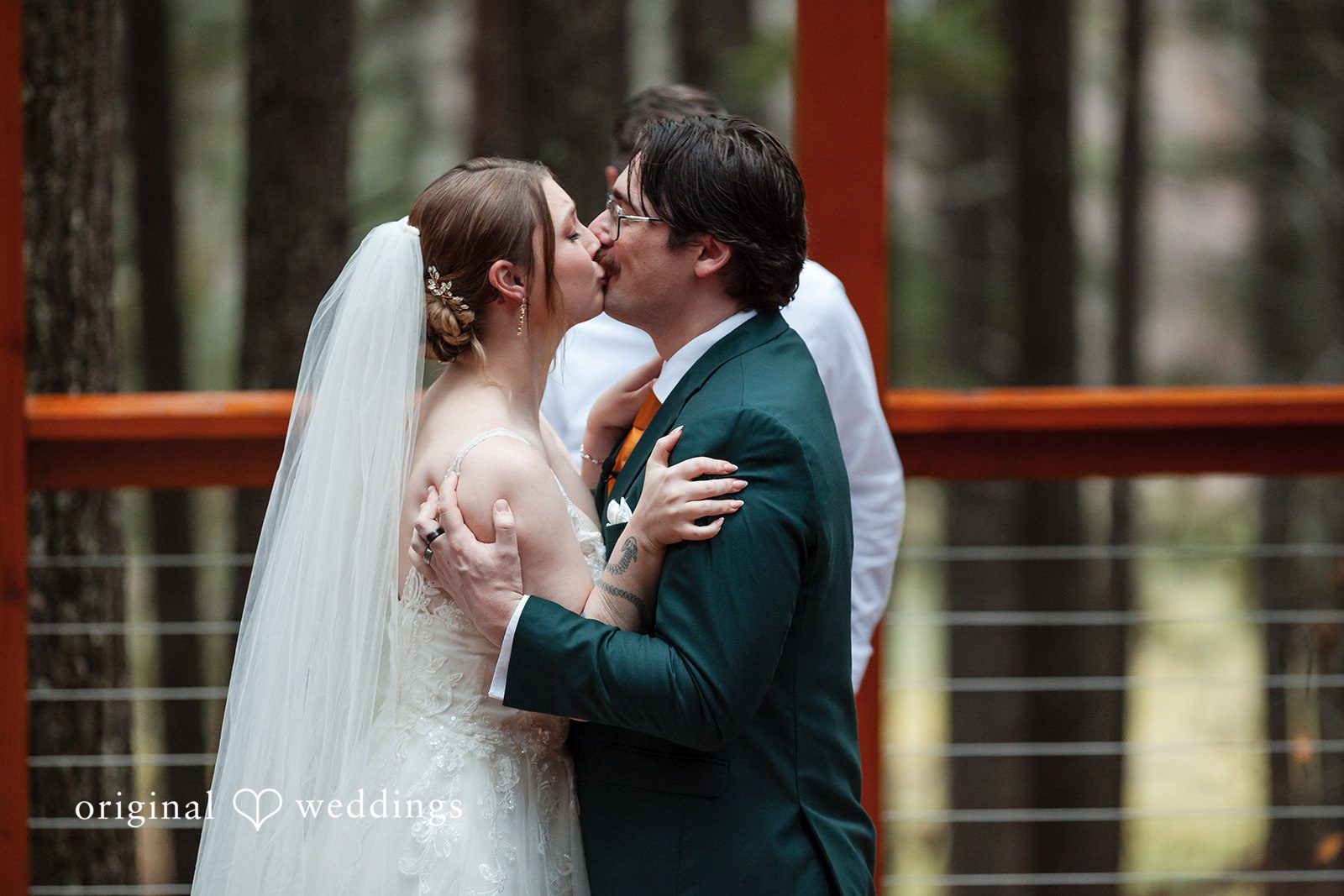 The couple shares their first kiss