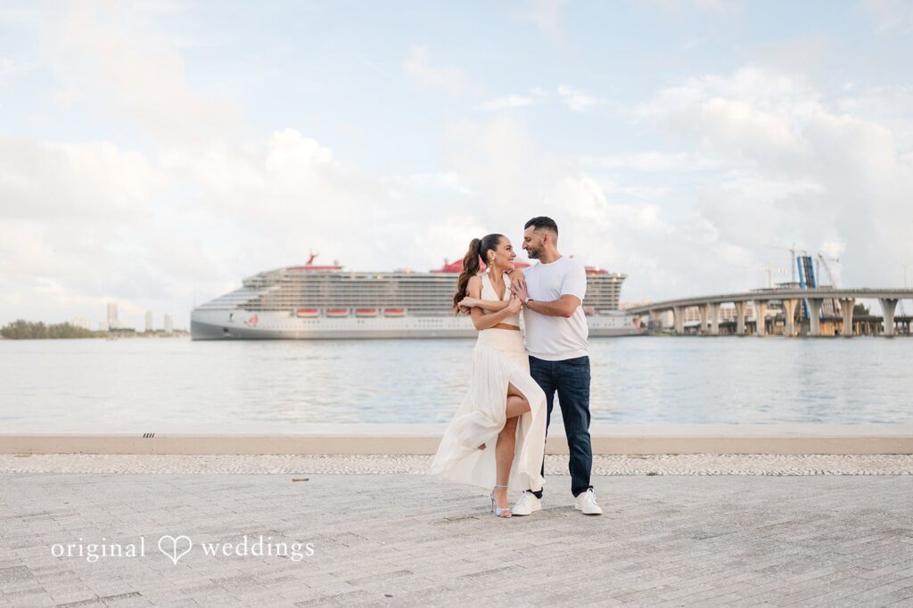 A playful and artistic moment captured by a Miami engagement photographer.