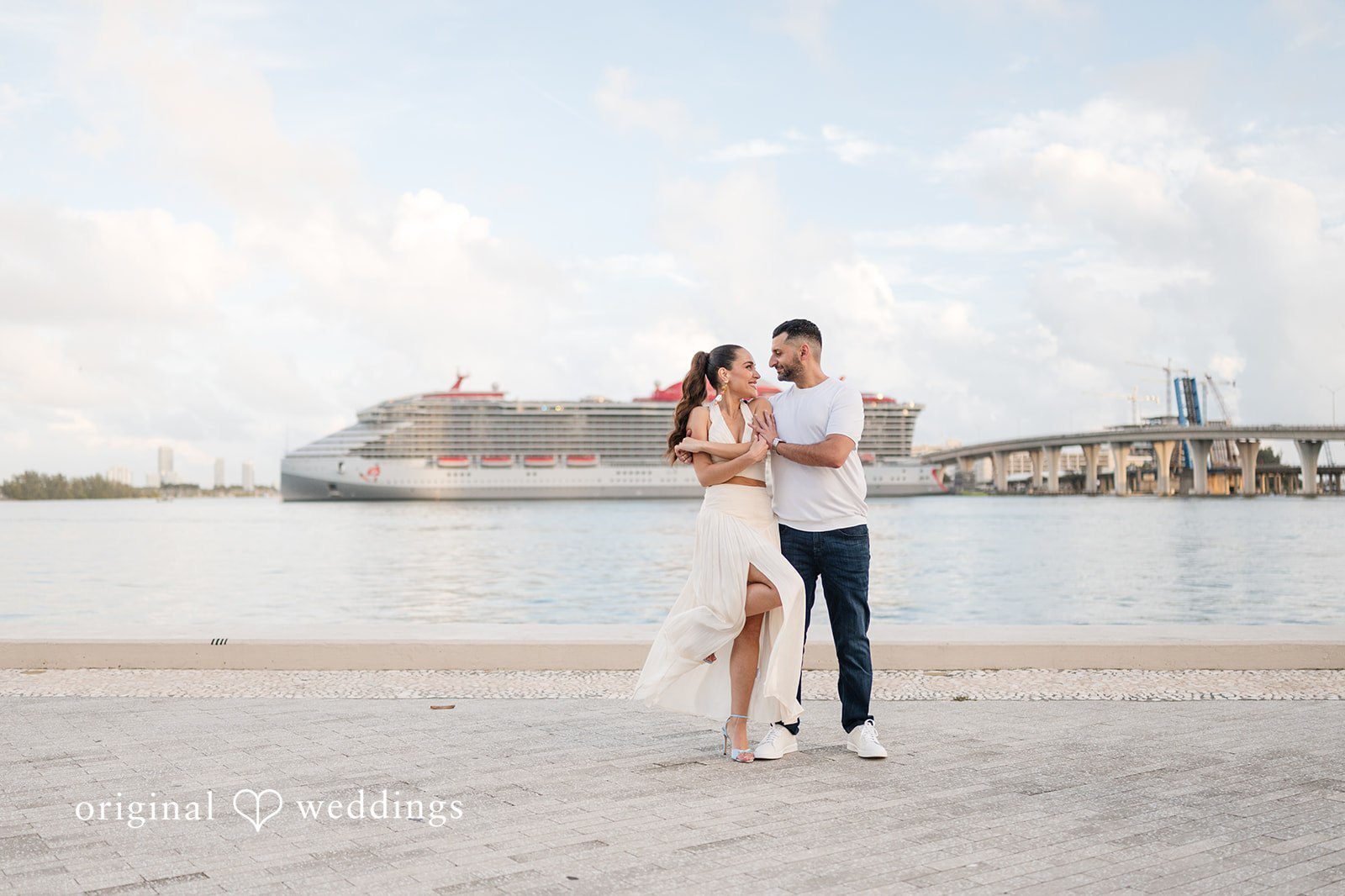 A playful and artistic moment captured by a Miami engagement photographer.
