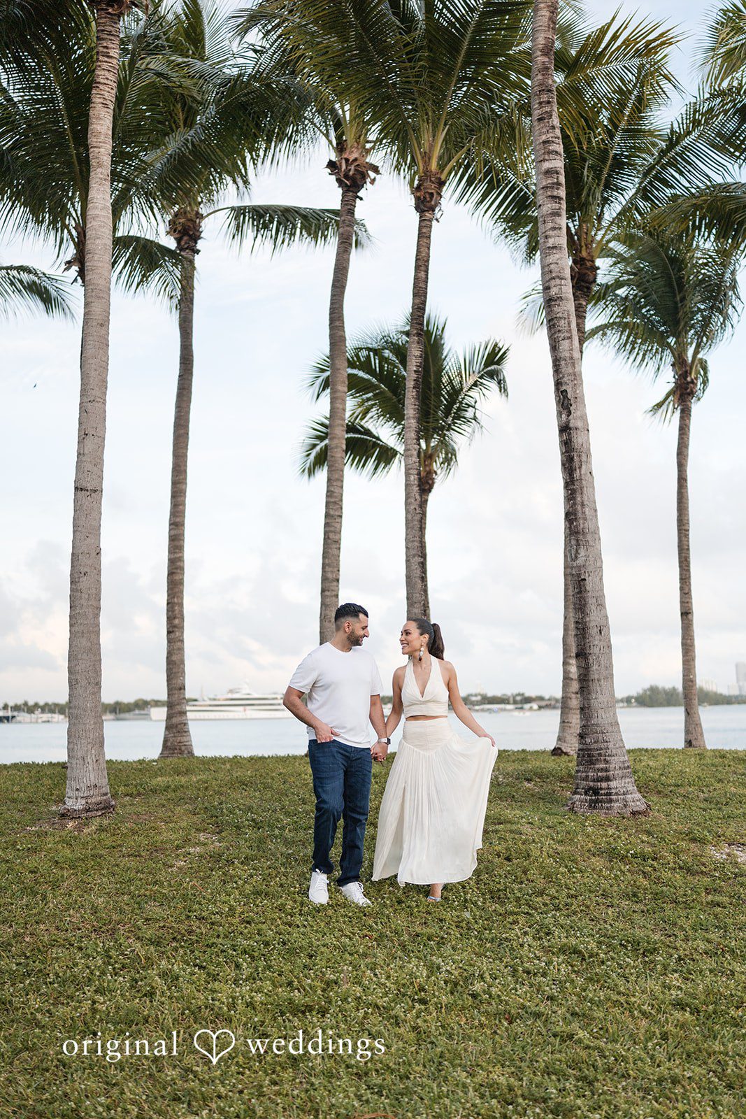 A tropical vibe with love under the palm trees.