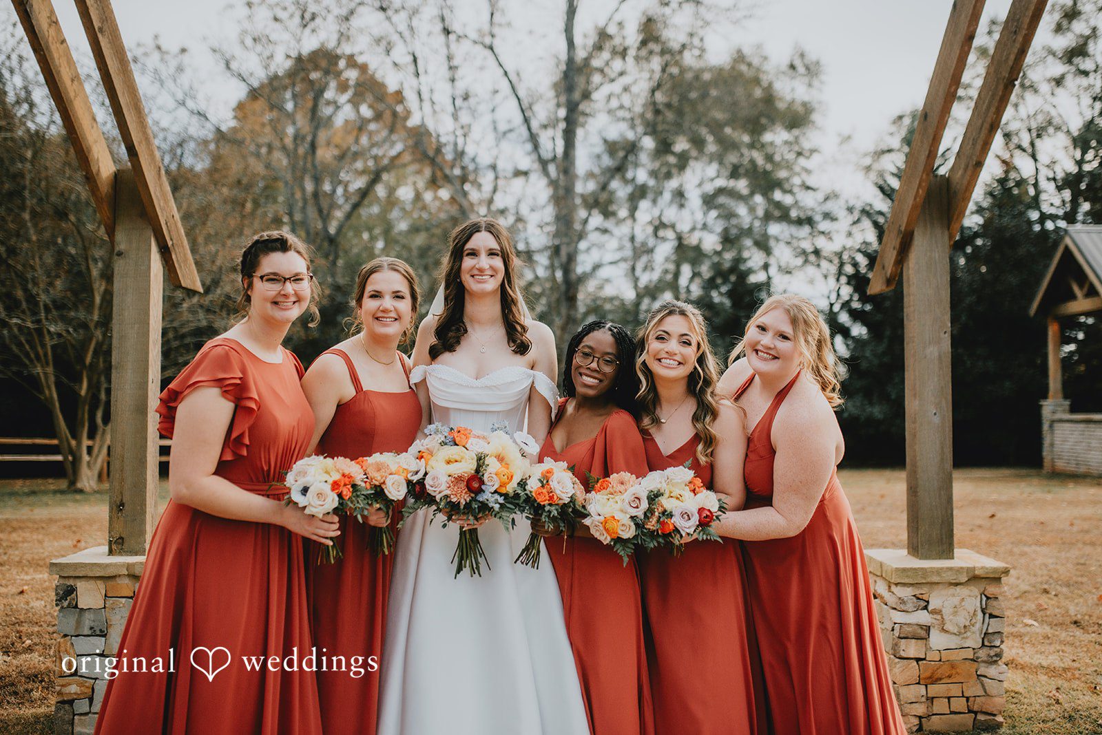 This bridesmaid group photo was photographed by an Atlanta Wedding Photographer with balanced composition.
