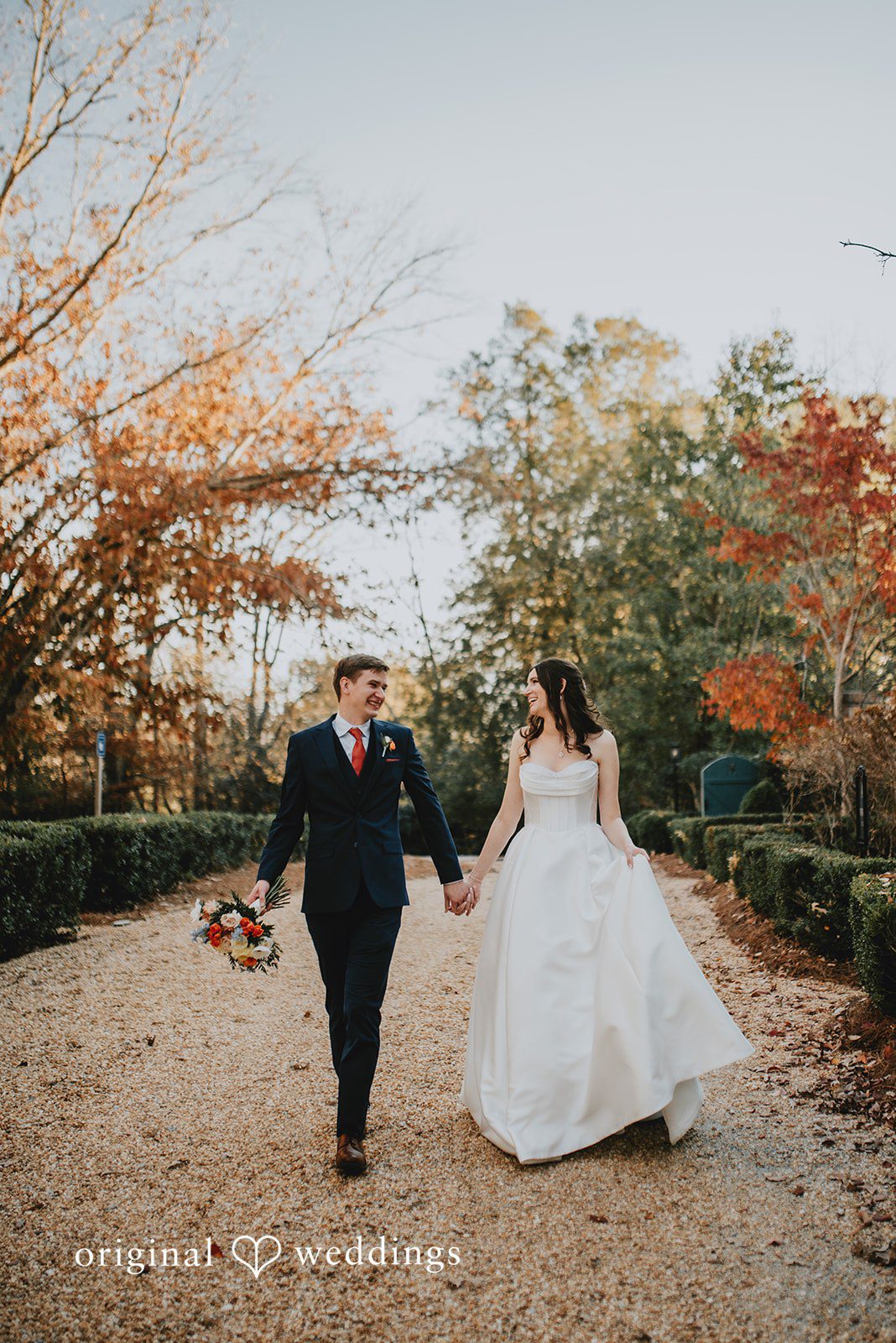 This outdoor walk scene was photographed by an Atlanta Wedding Photographer as part of an Atlanta Wedding Photographer wedding day story.