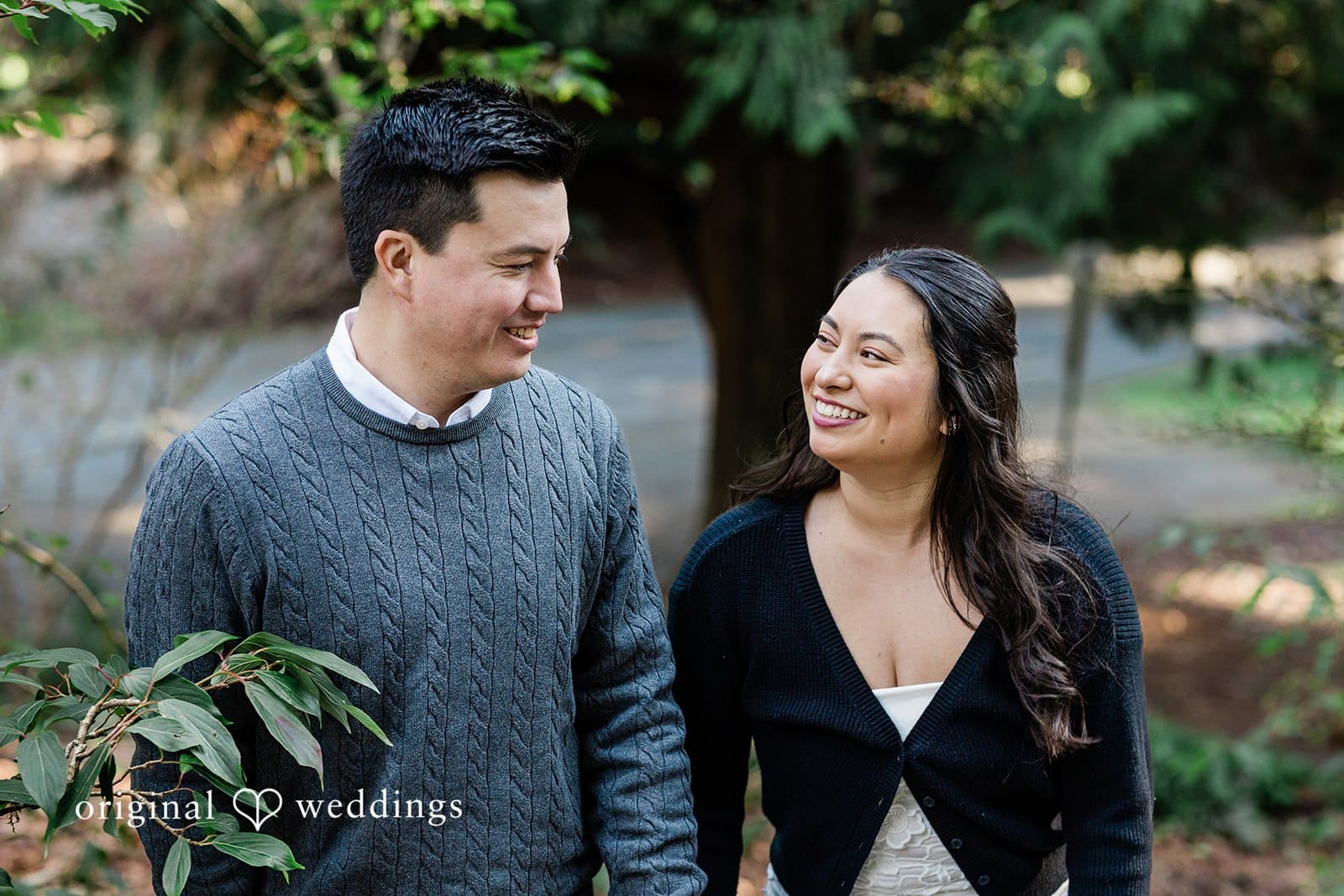 Couple smiling at each other at Washington Park Arboretum