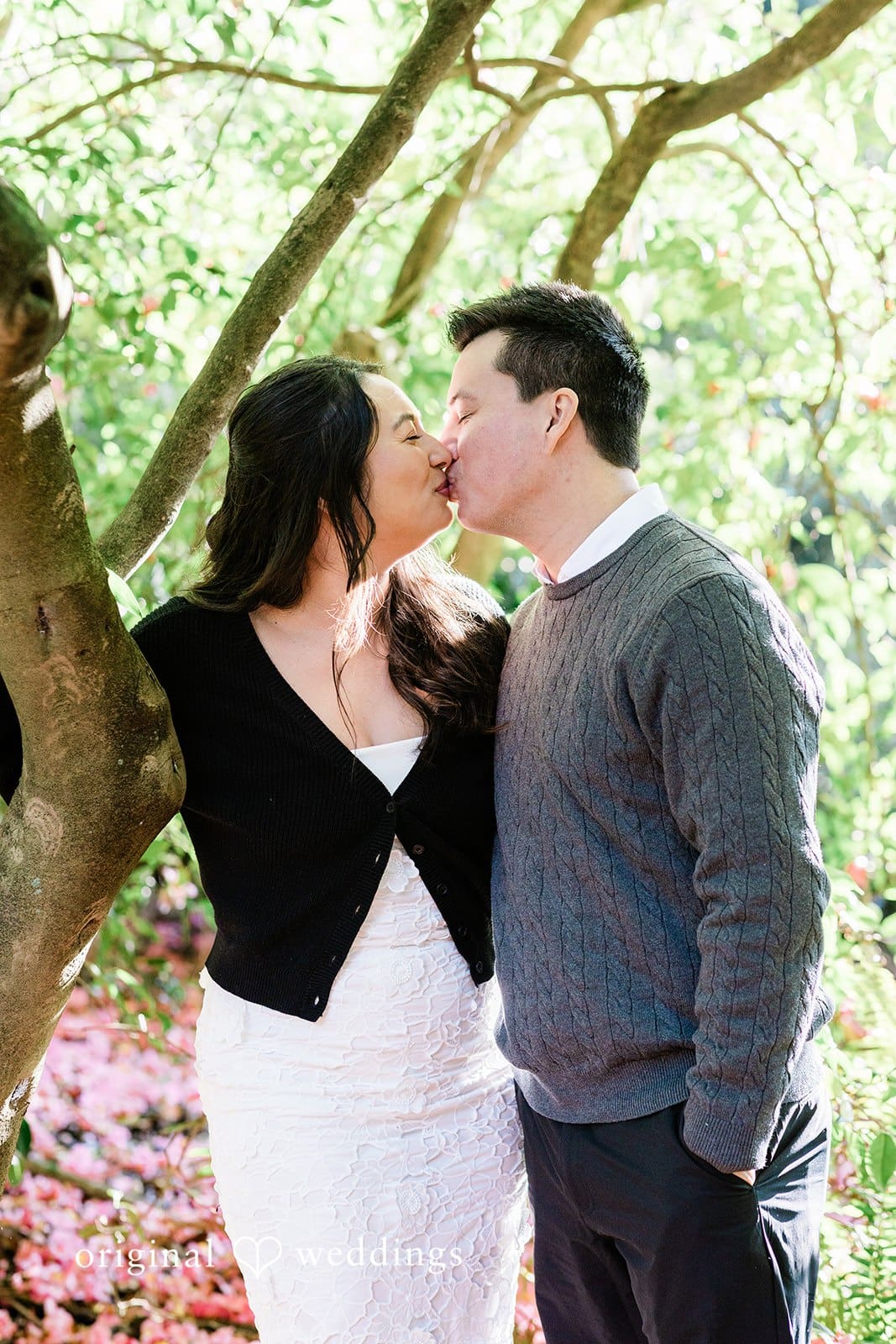Romantic kiss close-up of couple at Washington Park Arboretum