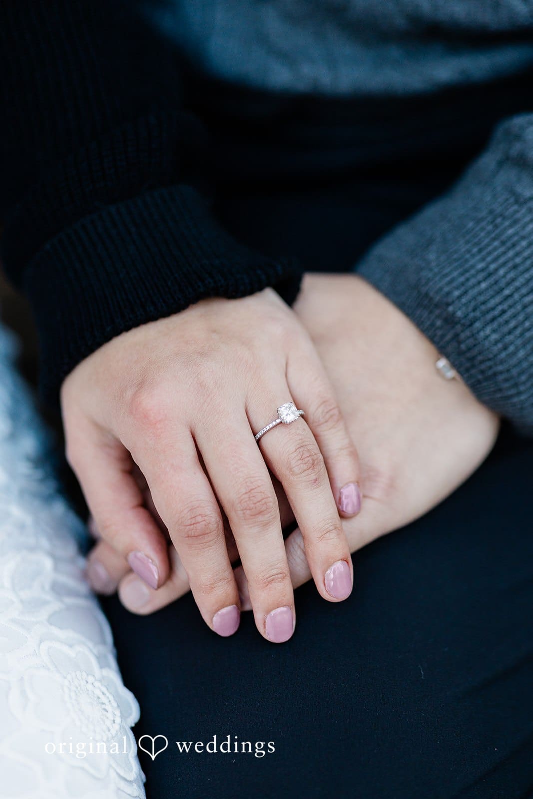 Engagement photography services by Original Weddings capturing close-up of couple with bride smiling at Washington Park Arboretum