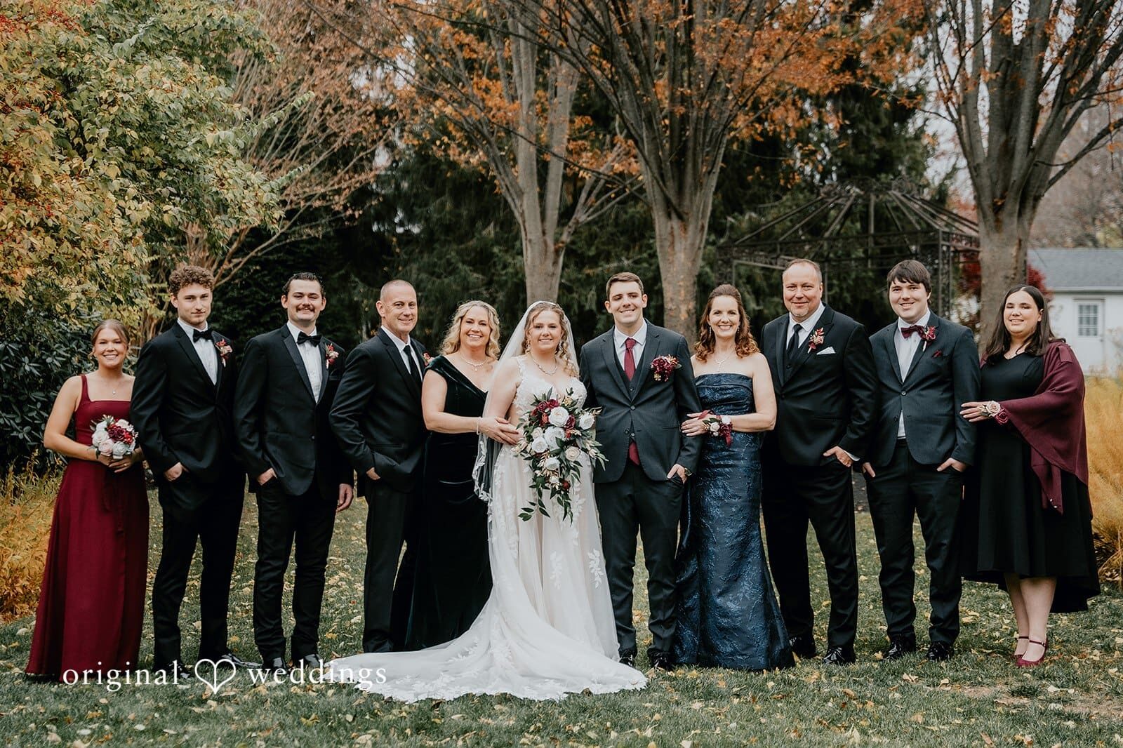 Our Philadelphia wedding photographer at Original Weddings captured a stunning portrait of the bride and groom with their wedding party at William Penn Inn