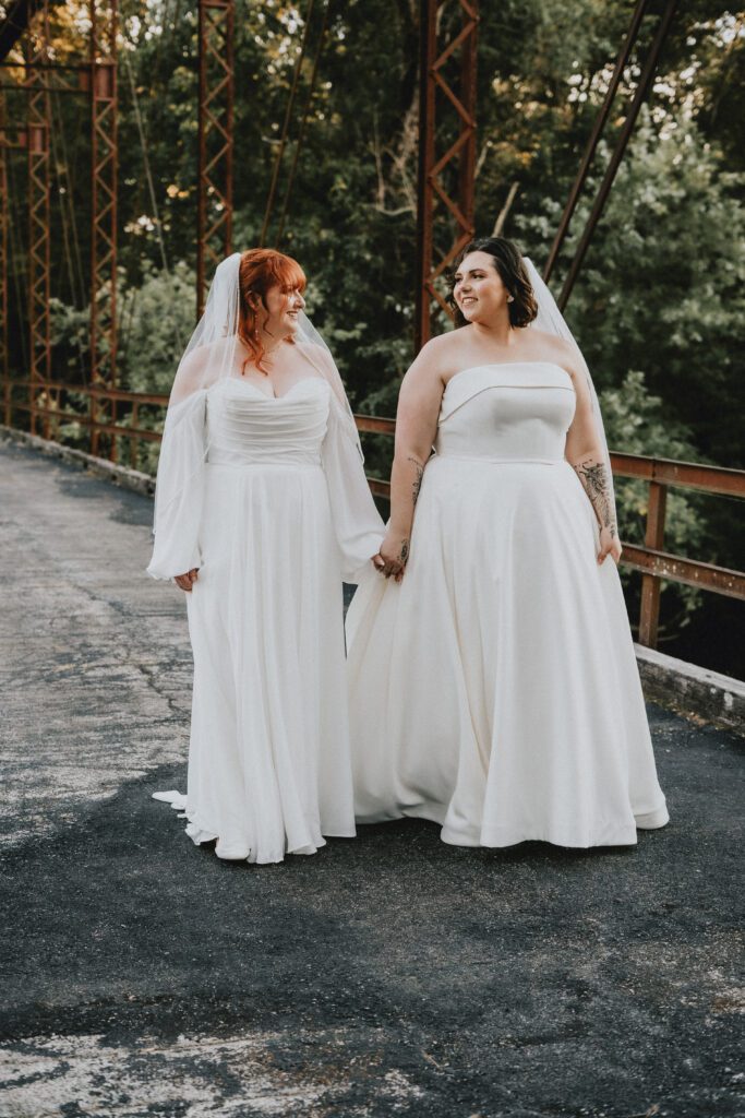 Jaelynn + Elese two brides looking at each other at wedding venues st louis