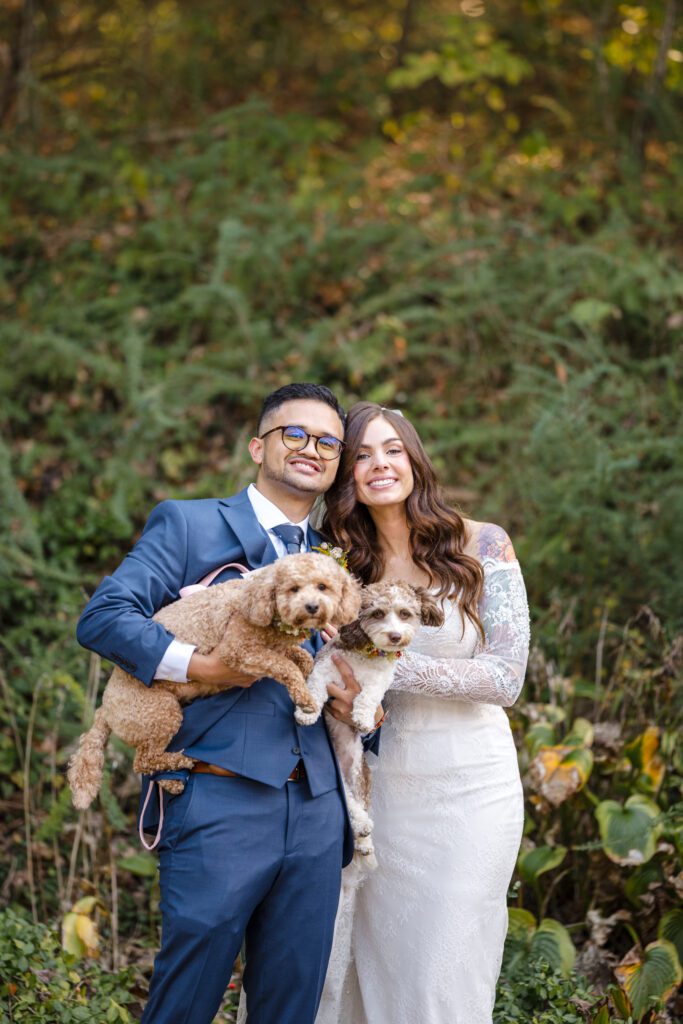 Gregorio + Macy bride and groom with dogs at wedding venues st louis