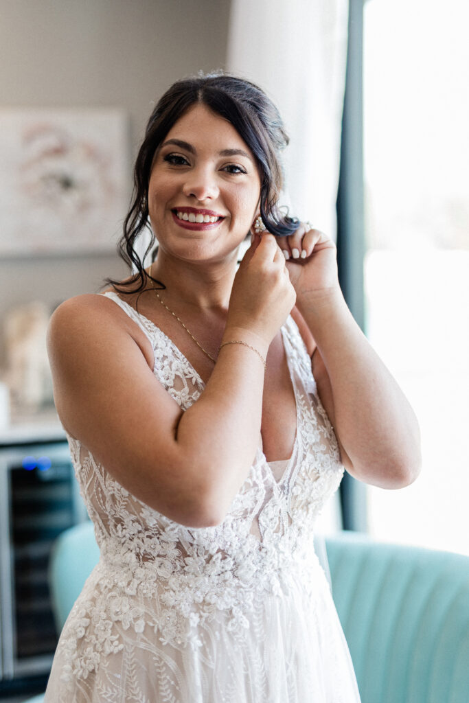 Gabriella + Alex bride getting ready at wedding venues st louis