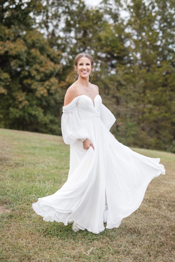 Jacob + Maria bride twirling dress at wedding venues st louis