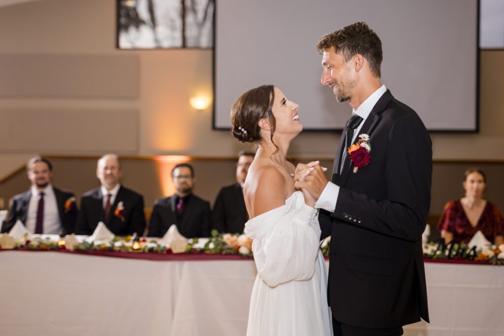 Jacob + Maria joyful bride and groom dancing at best wedding venues st louis