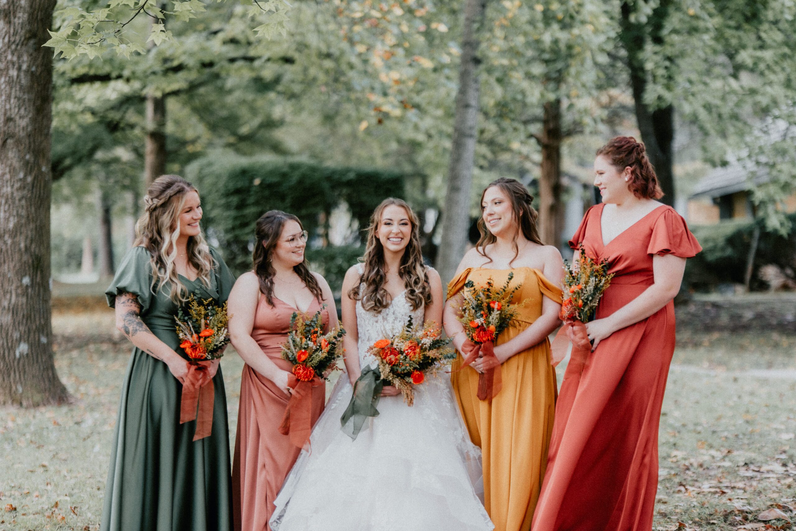 bride with bridesmaids at wedding venues st louis