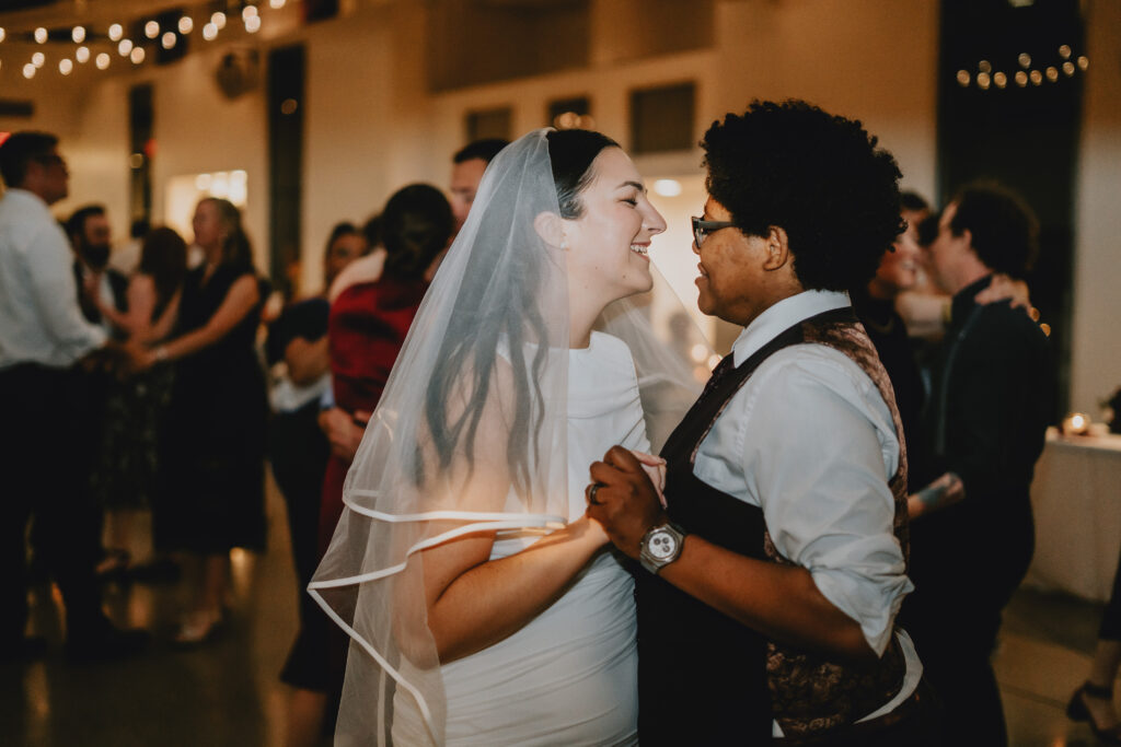 Diana + Kelsey energetic reception dance with guests at unique wedding venues st louis