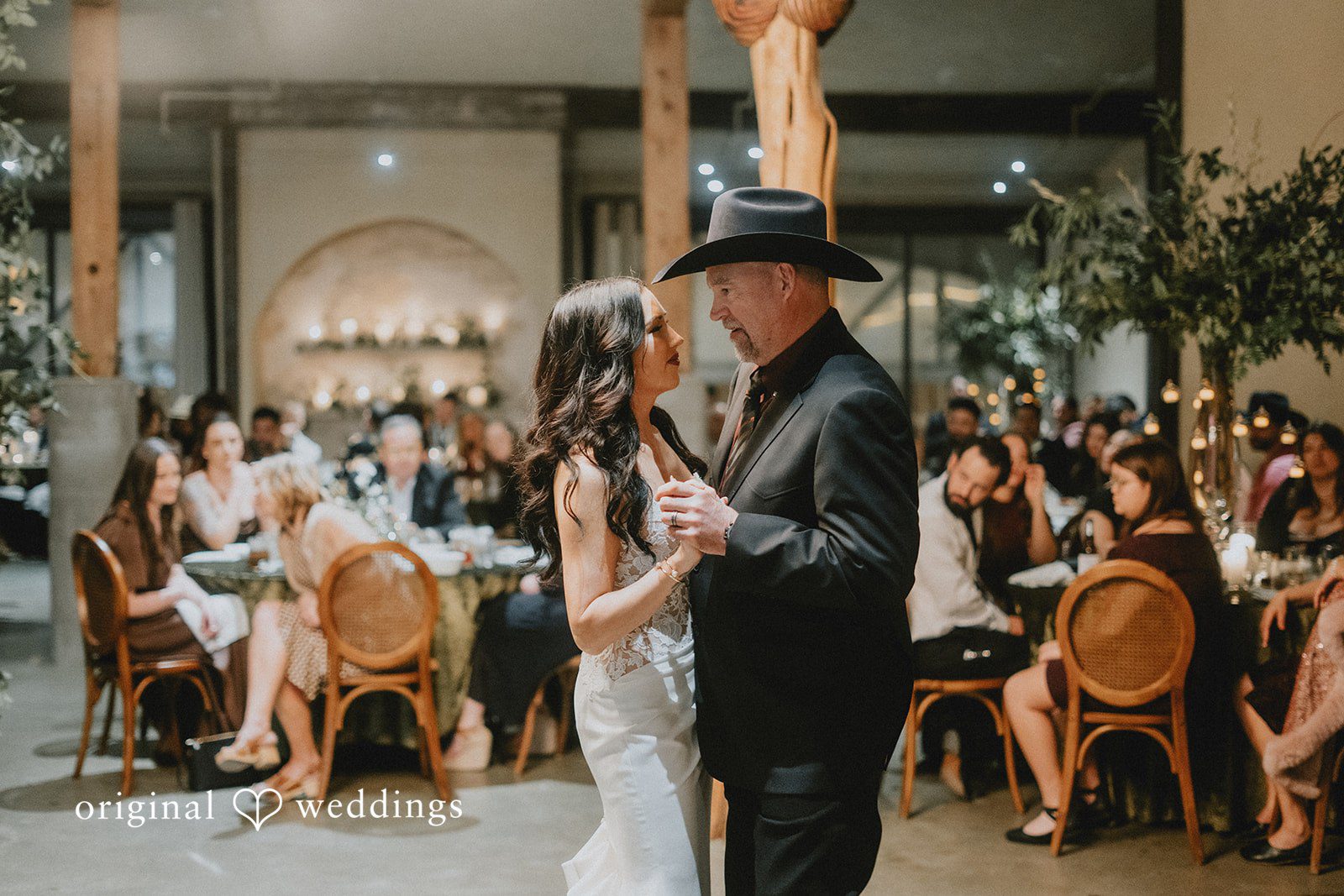The bride dances with her father