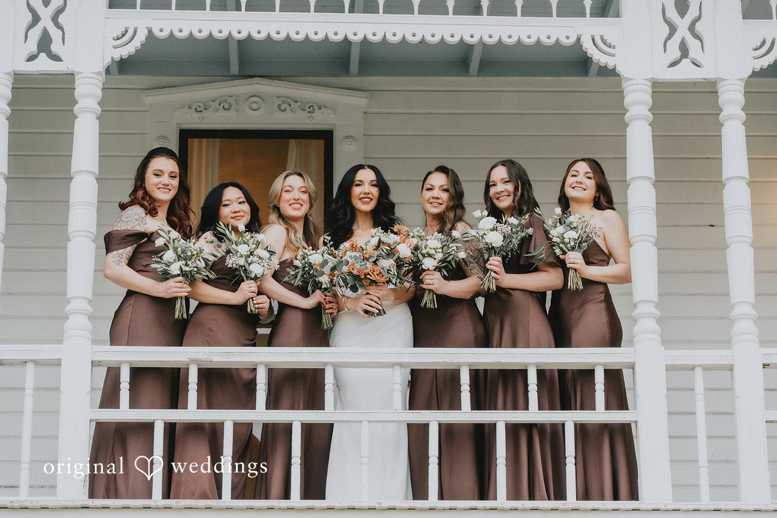 A stunning portrait of the bride and her bridesmaids at the gallery