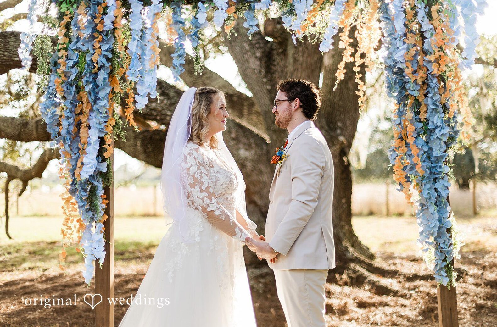 A ceremony portrait framed by natural light and landscape, styled by Tampa Wedding Photography.