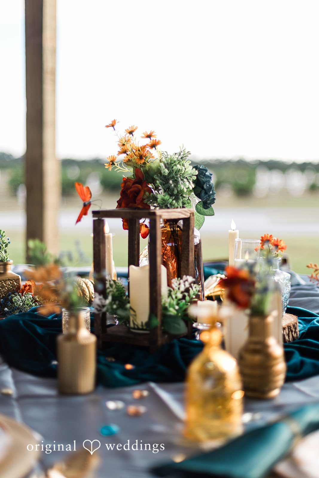 Reception décor with candles and florals styled beautifully for Tampa Wedding Photography.