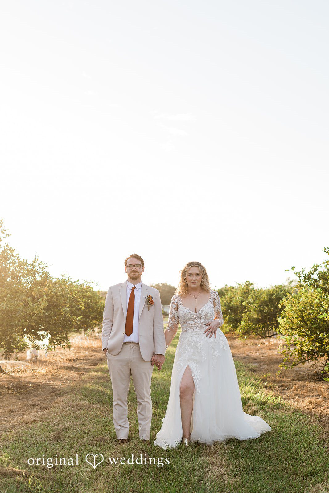 A relaxed outdoor couple portrait captured by Tampa Wedding Photography.