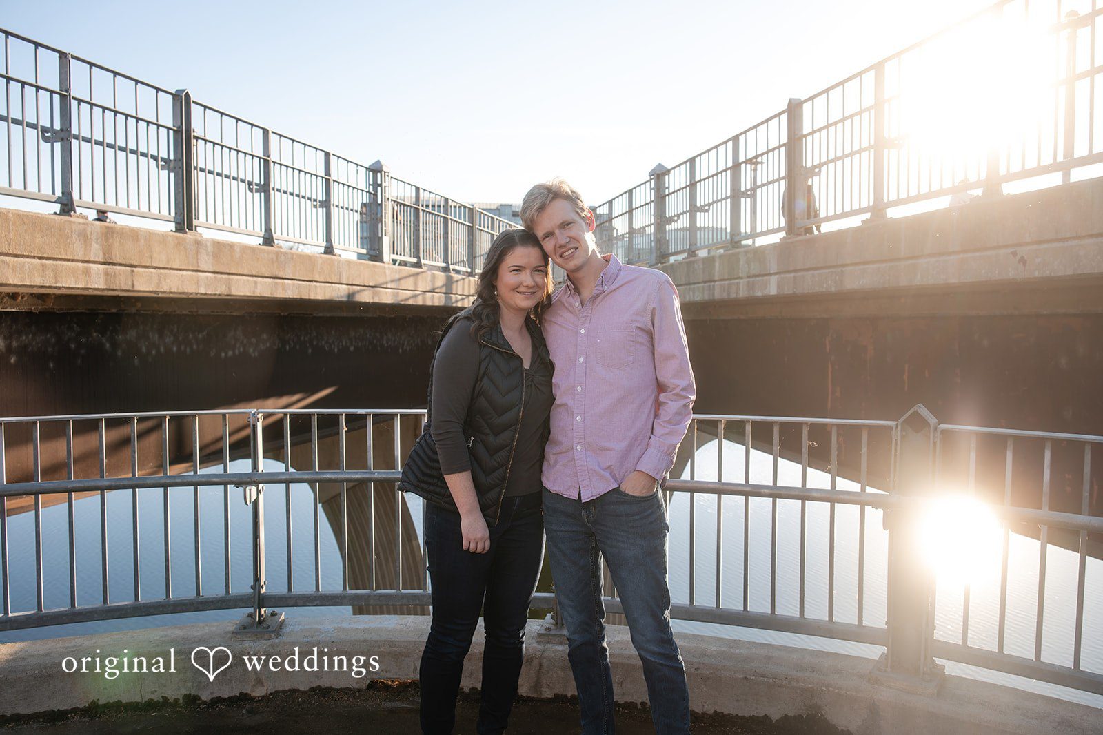 A portrait of the couple by the Pfluger Pedestrian Bridge